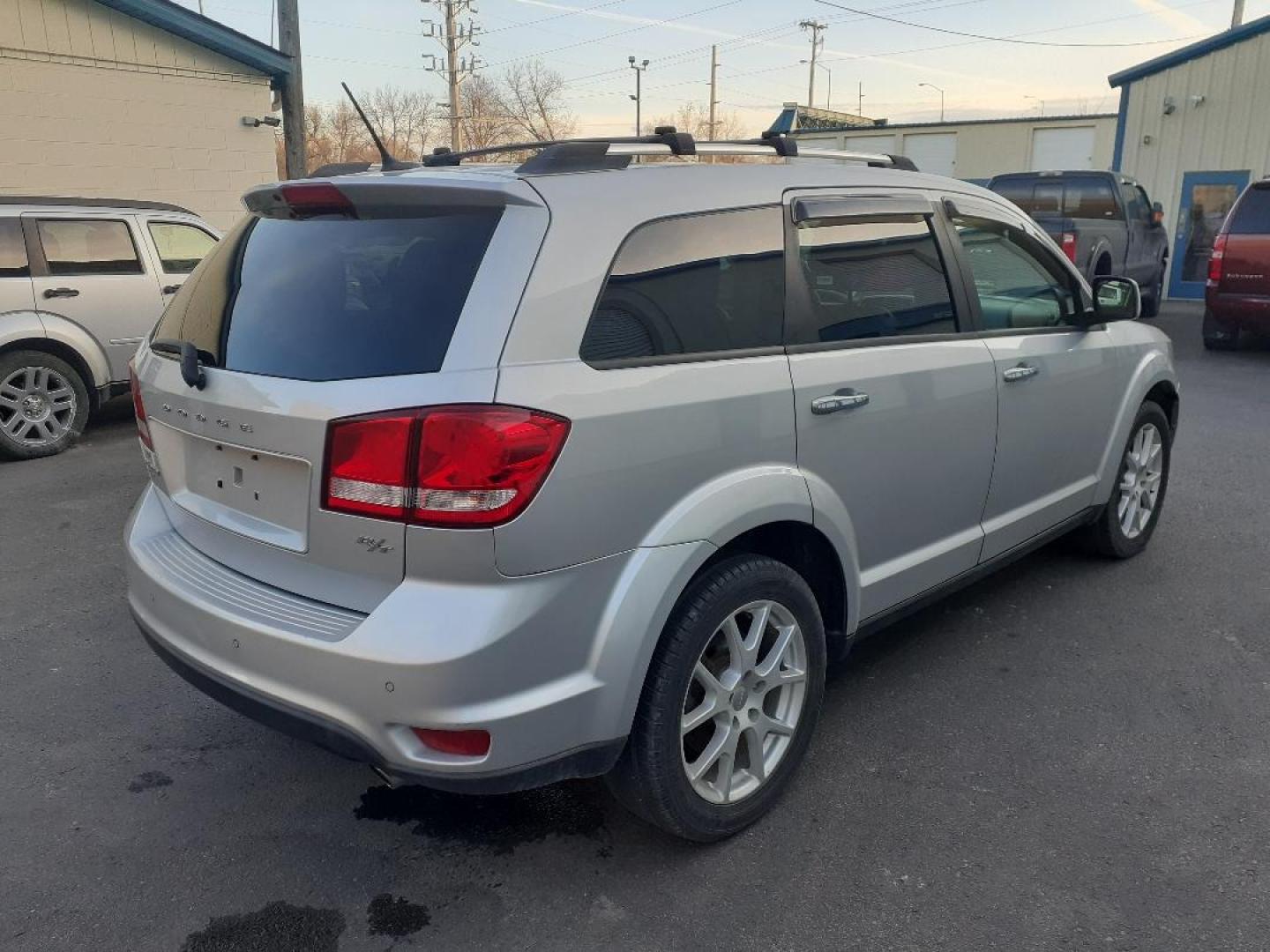 2013 Dodge Journey (3C4PDDFGXDT) with an 3.6L V6 DOHC 24V engine, 6-Speed Automatic transmission, located at 2015 Cambell Street, Rapid City, SD, 57701, (605) 342-8326, 44.066433, -103.191772 - CARFAX AVAILABLE - Photo#4